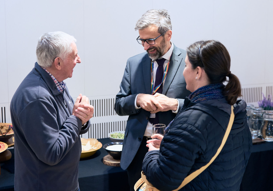 Attendees enjoy the evening reception.